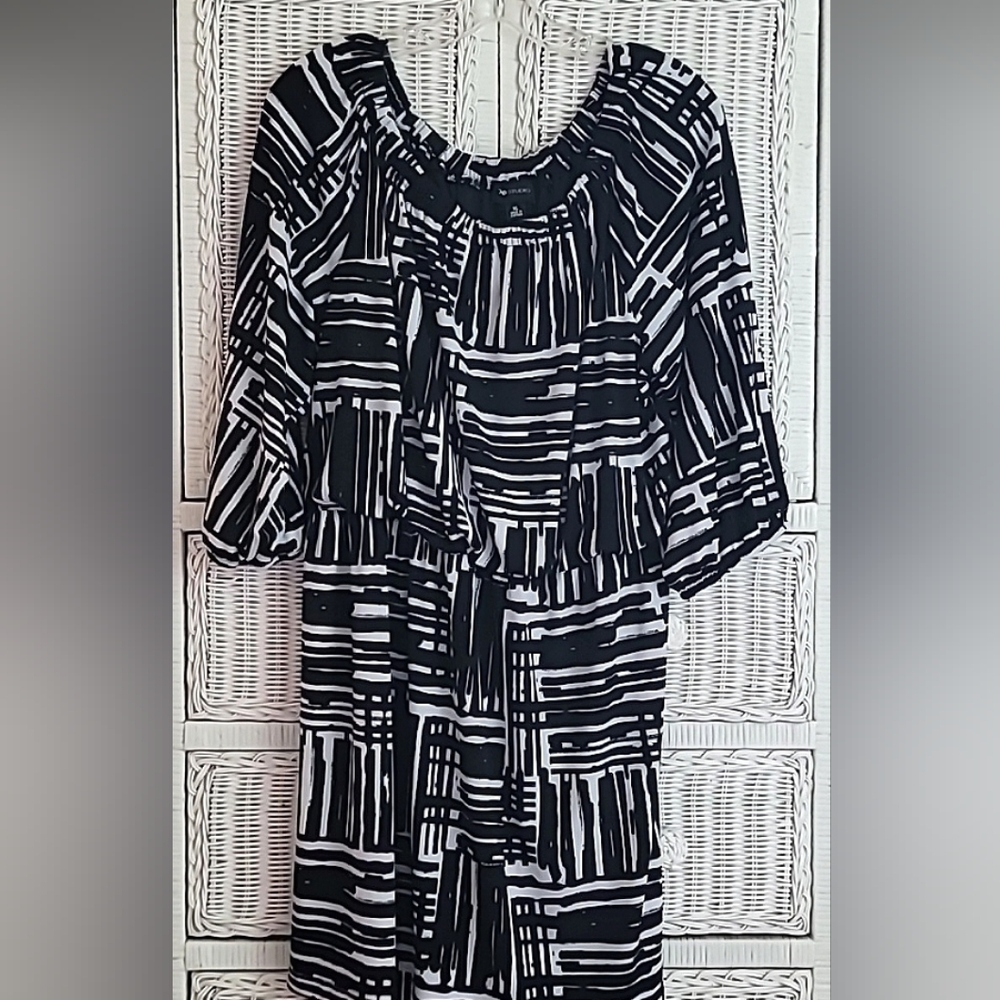 AB Studio Dress with 3/4 Sleeves and cinched at the waist.